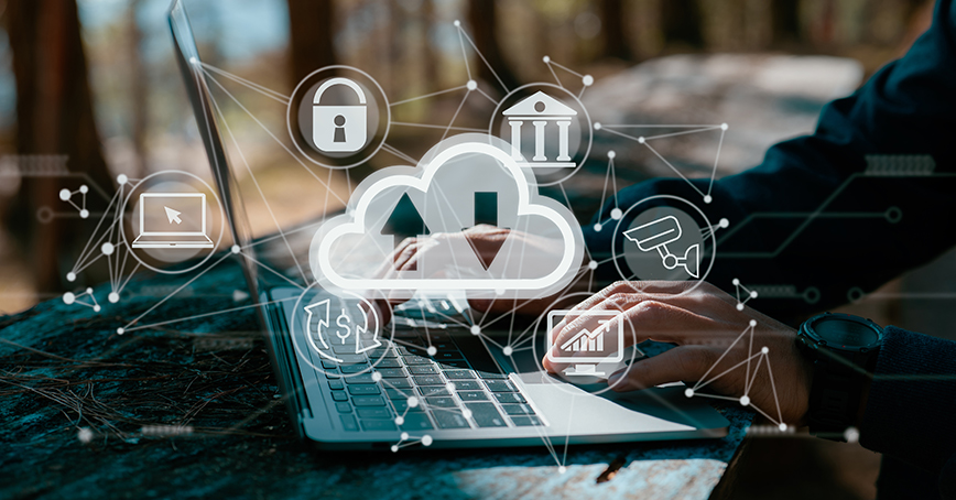 An Opus Interactive blog post image of a man working on his laptop, there are security and cloud icons overlayed on top.