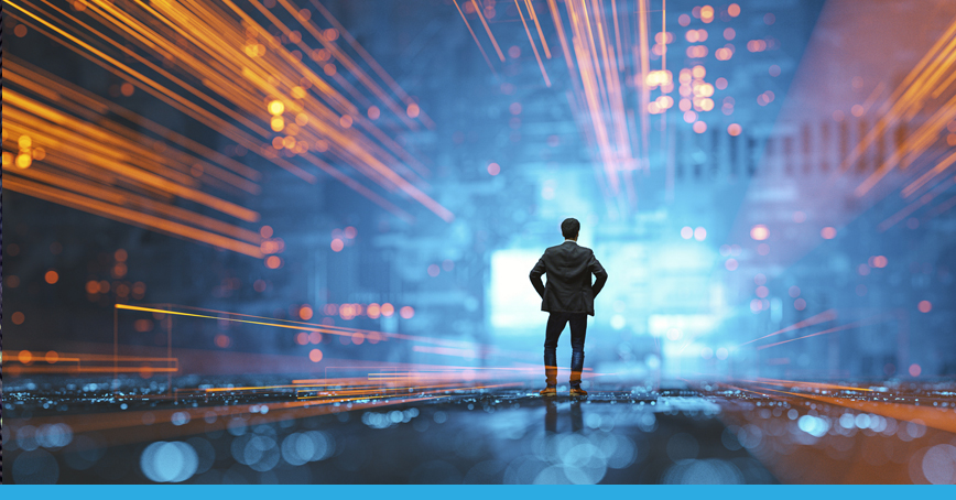 A blog post image depicting a man in a suit, with his hands on his hips triumphantly over a blue abstract background with bright gold accents. The future is bright.